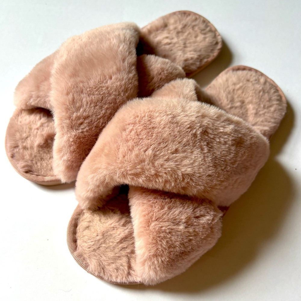 Light pink fuzzy slippers